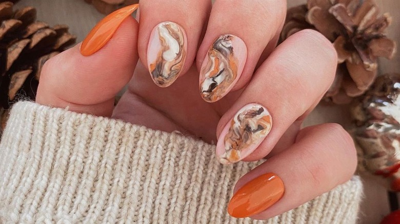Orange and brown manicure