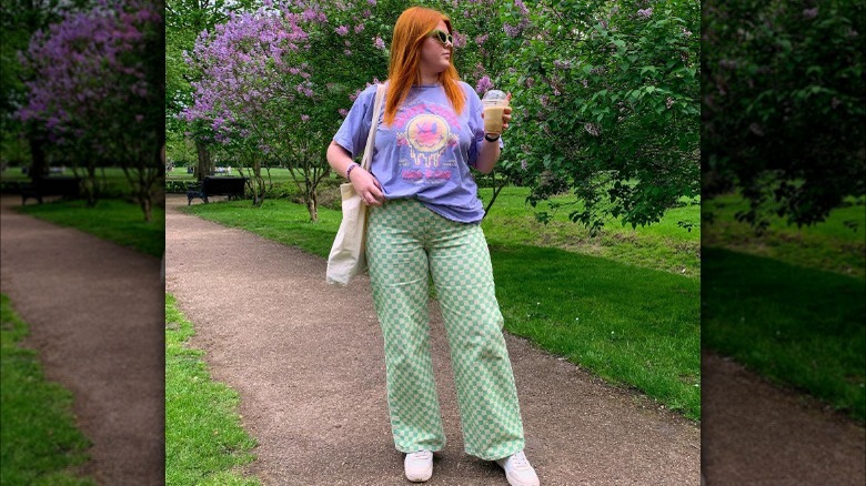 Woman in patterned green pants