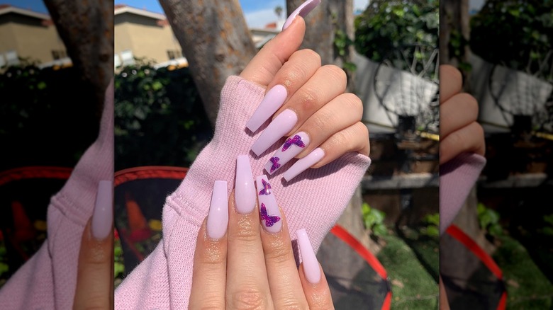 Lilac nails with butterfly