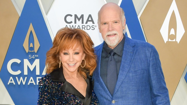 Reba McEntire with Rex Linn on the red carpet in 2020