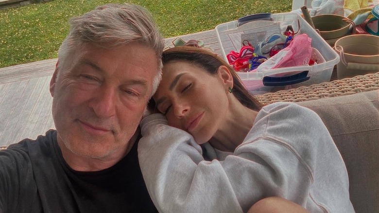 Hilaria Baldwin resting on Alec Baldwin's shoulder