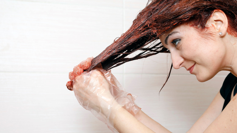 Woman dying hair red 
