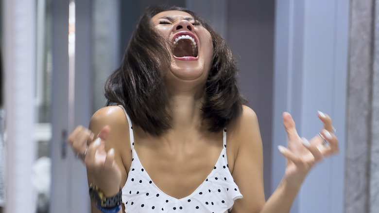 woman screaming in anger 