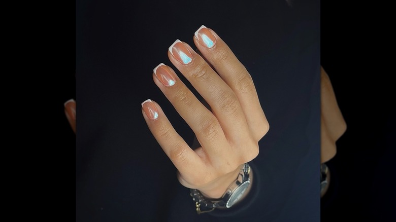 Sheer blue chrome nails