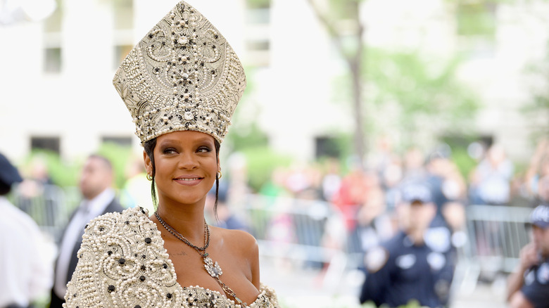 Rihanna at the 2018 met gala in head piece