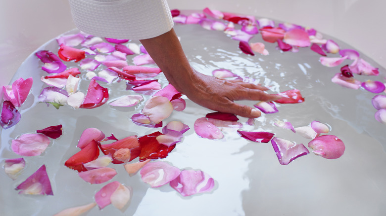 rose petals in bathwater
