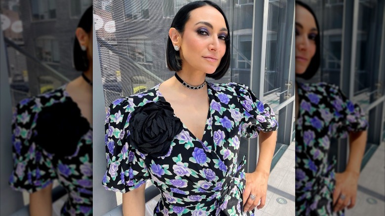 Mana Mansour poses in an oversized rosette brooch