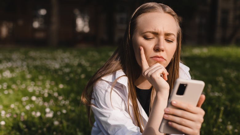 Woman looking at phone 