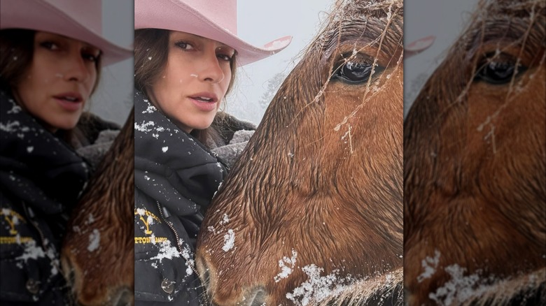 Dawn Olivieri on Instagram in the snow with a horse