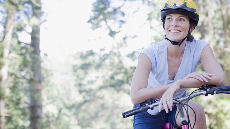 woman on bike smiling