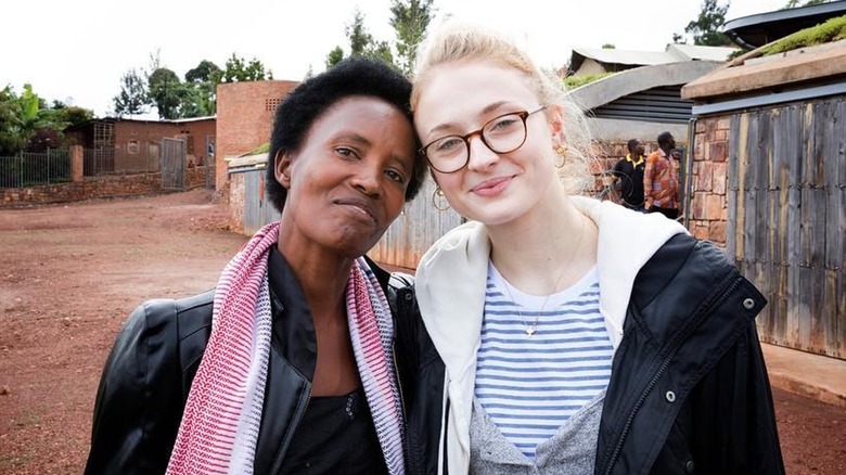 Sophie Turner with a friend wearing no makeup