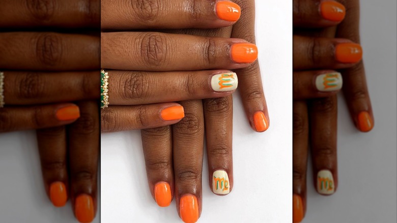 Orange Virgo nails