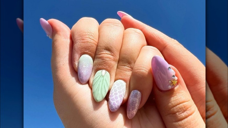 Mermaid manicure with shell-inspired designs