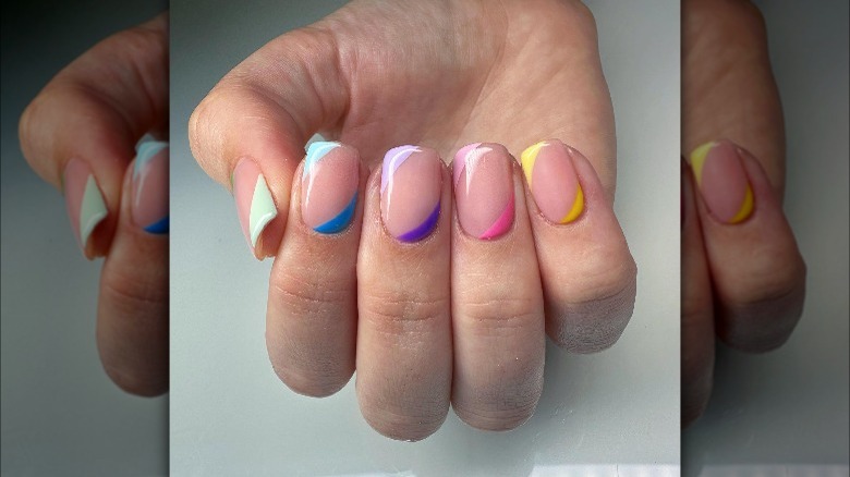 A manicure with rainbow beds and tips 