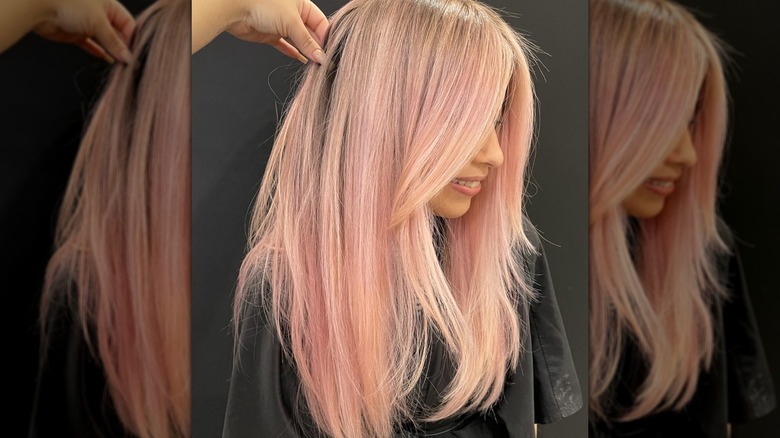 Woman with baby pink hair