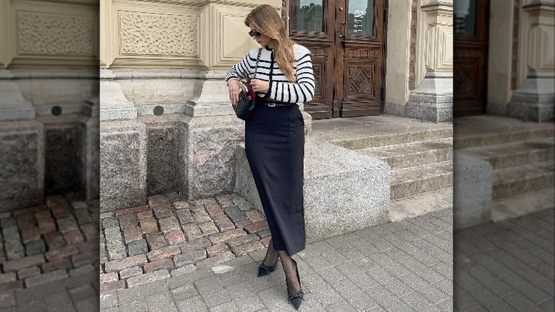 Woman outside in pencil skirt