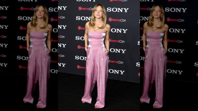 Sydney Sweeney in a pink jumpsuit