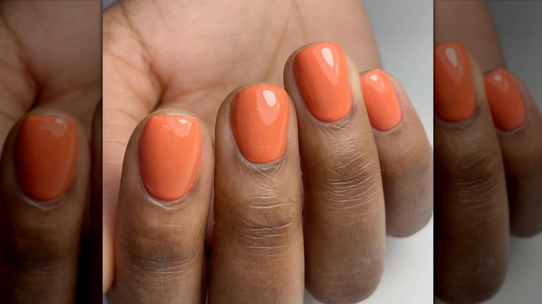 Full tangerine manicure