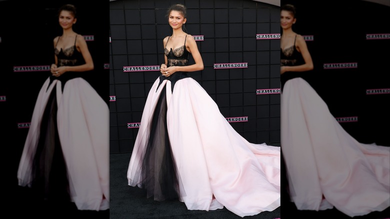 Zendaya in a black and pink gown