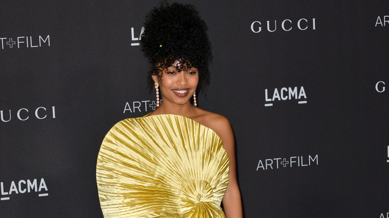 Yara Shahidi smiling with an updo at the LAMCA Gala