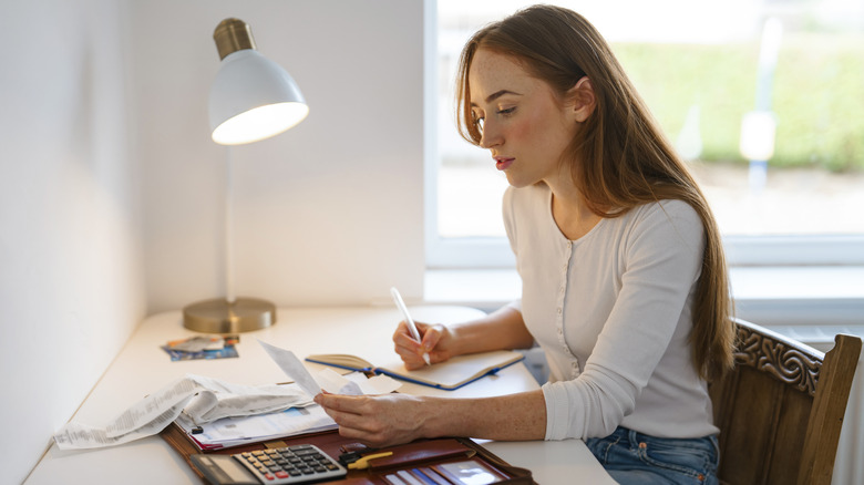 Woman paying with credit card