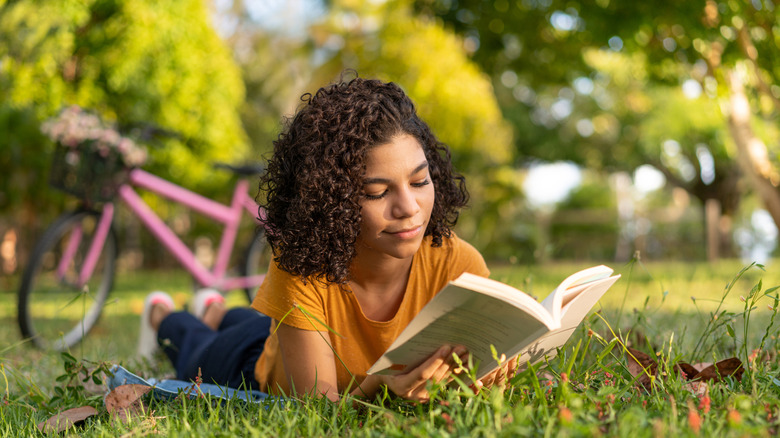 Woman reading in park