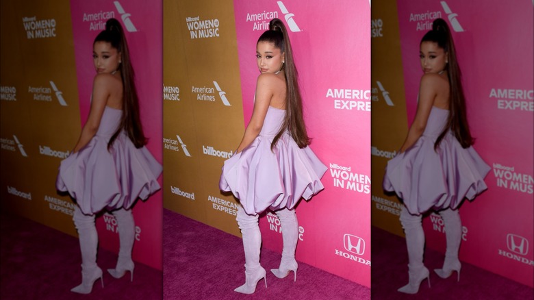 Ariana Grande in a purple mini dress with a bubble skirt