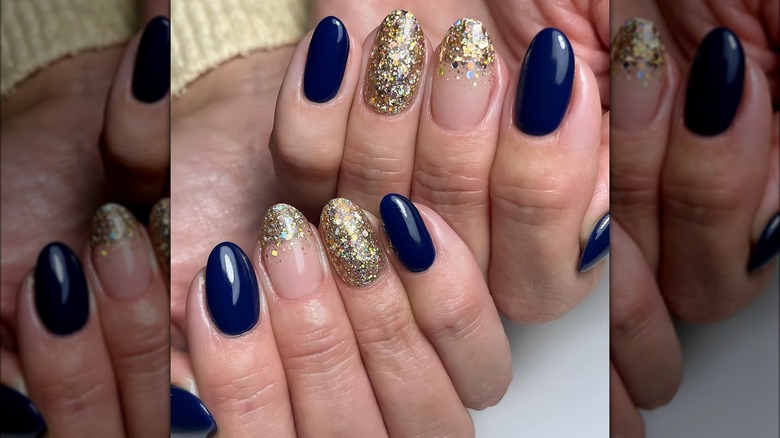 Dark blue and gold manicure