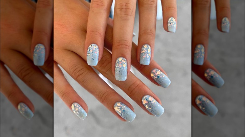 Light blue nails with glitter