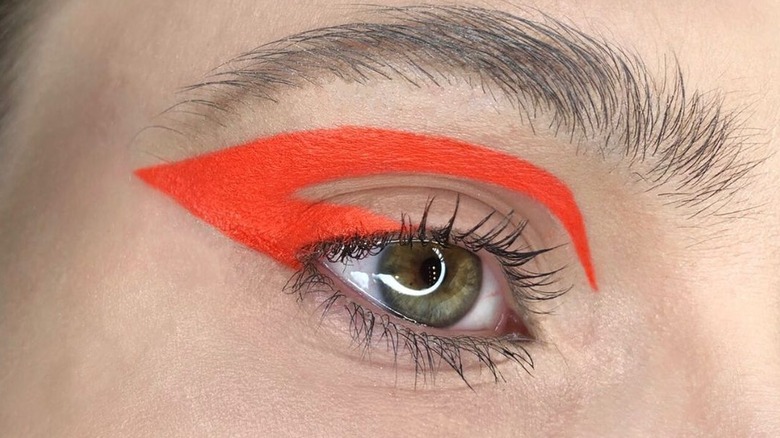 Bright orange eyeliner