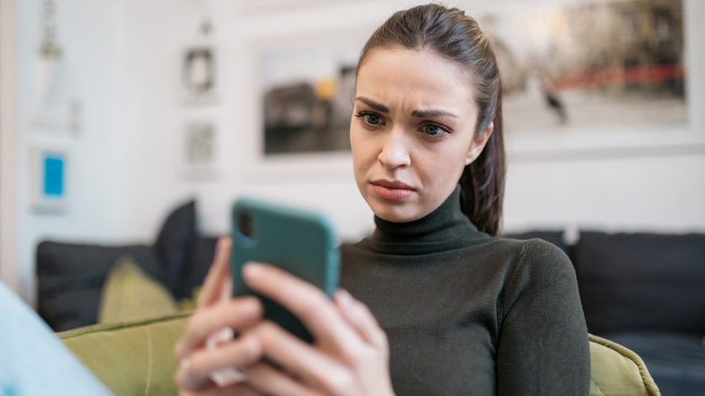 Woman concerned at phone