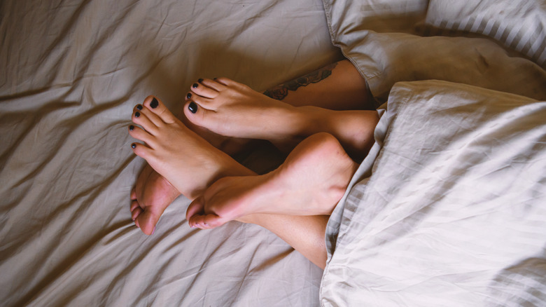 Two pairs of feet