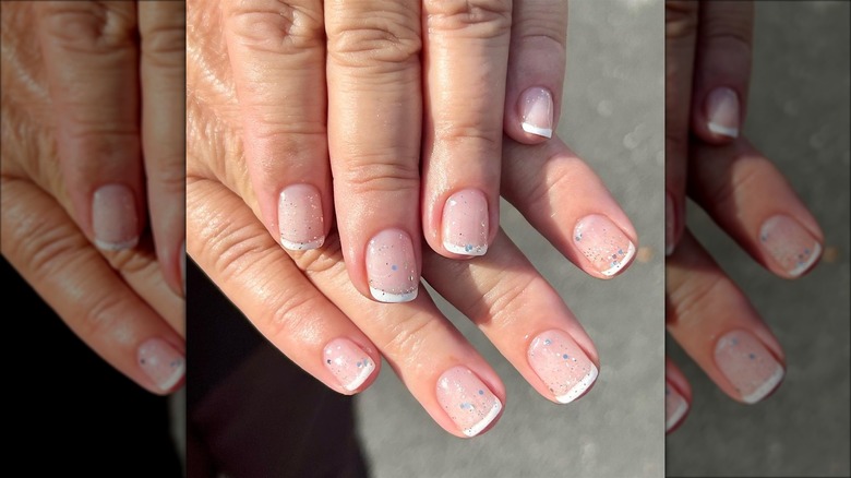 Glitter over a French manicure