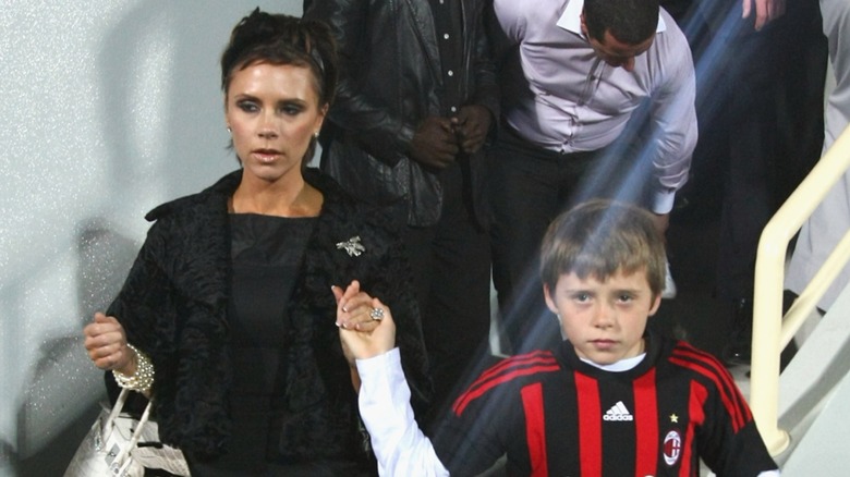 Victoria Beckham with her son