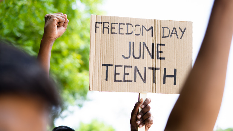 Sign saying "Freedom Day, Juneteenth"