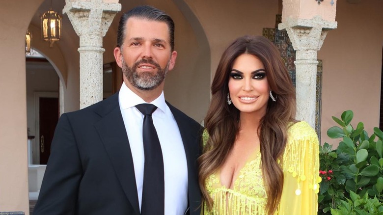 Donald Trump Jr. posing with Kimberly Guilfoyle