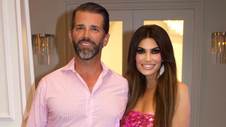 Donald Trump Jr. posing with Kimberly Guilfoyle