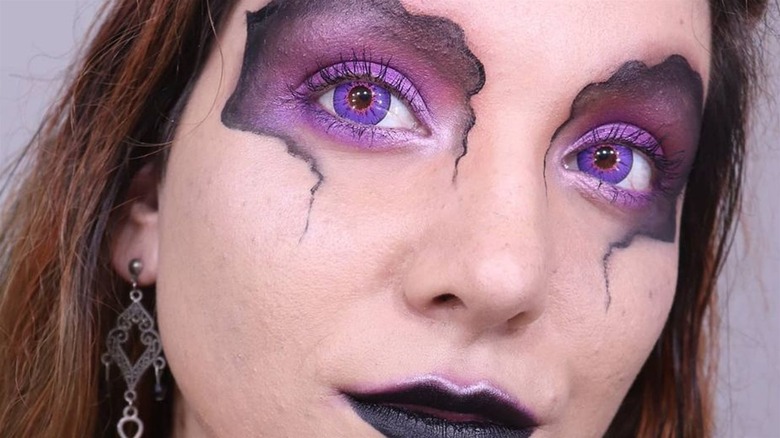 Woman with purple eyes