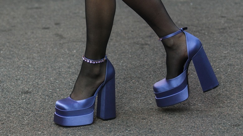 Woman in purple platform heels