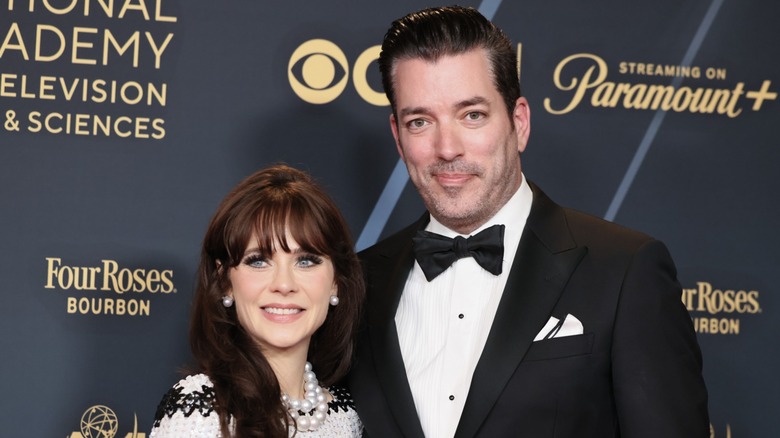 Zooey Deschanel on the red carpet with Jonathan Scott