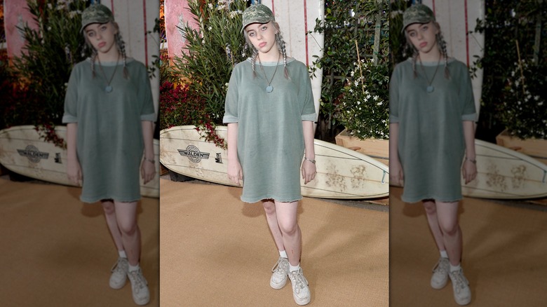 Young Billie Eilish wearing a t-shirt dress at a 2016 Teen Vogue event