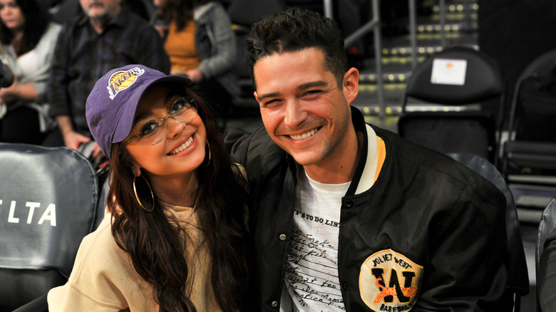 Sarah Hyland and Wells Adams together at a basketball game