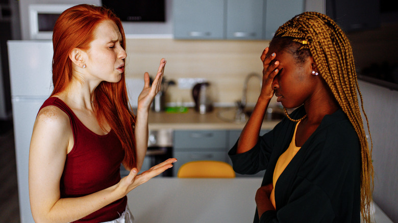 Two women arguing in the kitchen