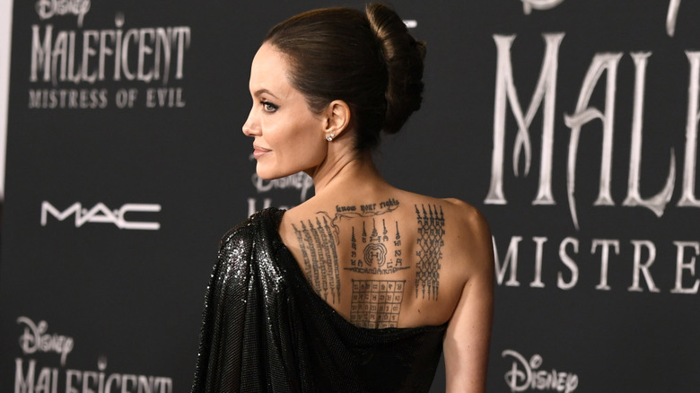 Angelina Jolie back tattoos