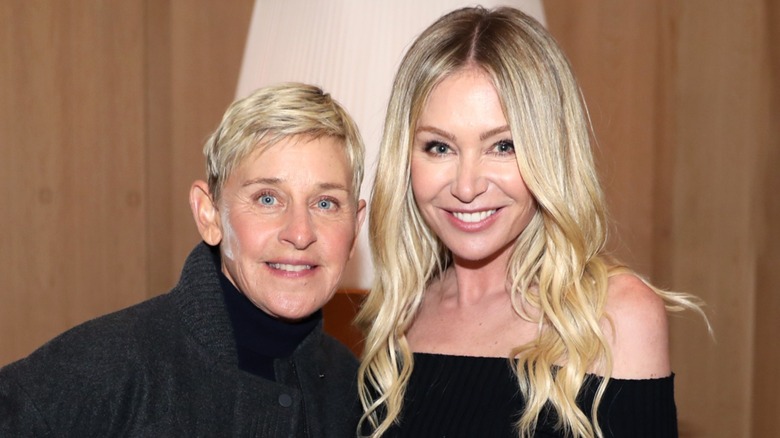 Ellen DeGeneres posing with Portia De Rossi