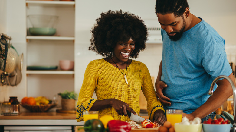 Couple cooking together 