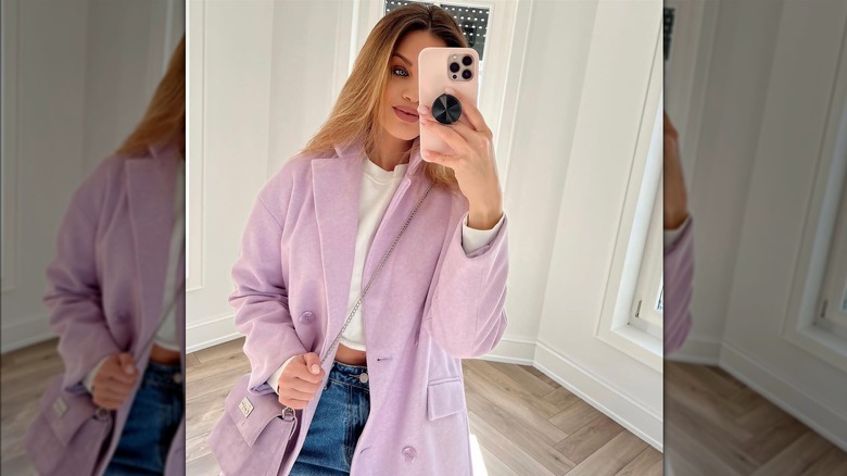 Wearing lavender coat