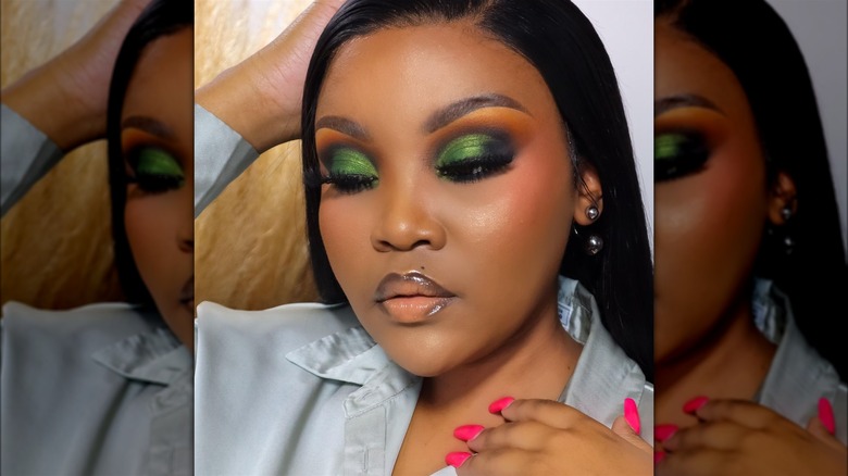 Woman wearing dark green eyeshadow