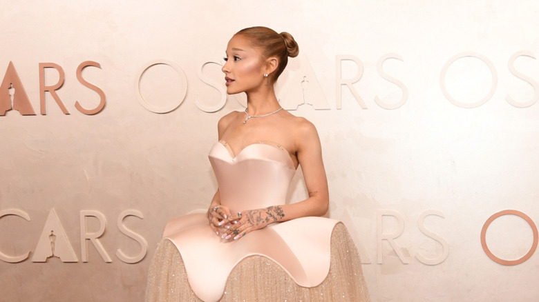 Ariana Grande in a pink dress at the 2025 Oscars