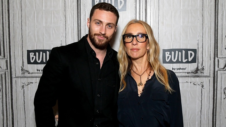 Aaron Taylor-Johnson posing with Sam Taylor-Johnson